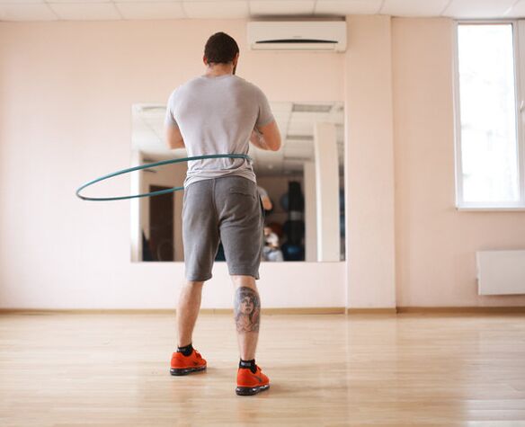 Rotating a hoop helps a man improve power